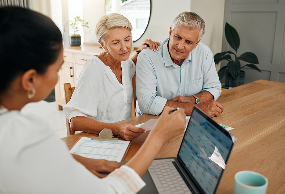 Tax professional advising retired clients on 2026 retirement tax planning strategies, including Roth conversions and required minimum distributions
