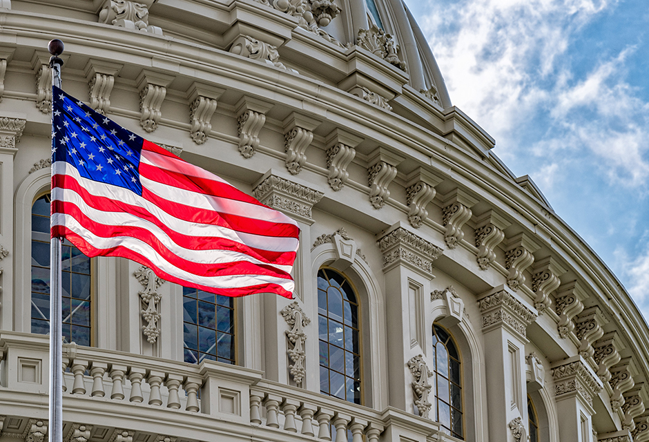 American flag outside the U.S. Capitol building representing IRS filing season performance and the Taxpayer Advocate Service report to Congress