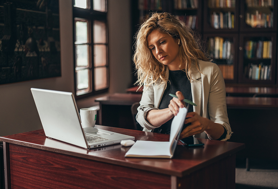 Tax professional researching proposed IRS regulations and evaluating how much authority to give preliminary tax guidance