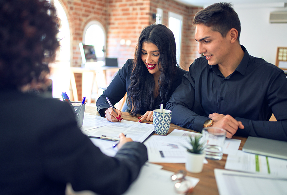 Tax professional advising business owners on adding members to a single-member LLC and partnership tax reporting