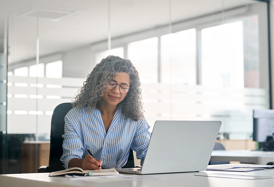 Tax professional reviewing IRS penalty relief documentation for reasonable cause and willful neglect claims