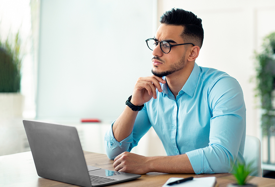 Tax professional reviewing minister housing allowance rules for income tax exclusion and self-employment tax treatment