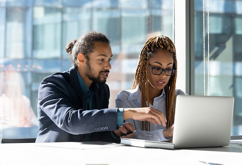 Tax professional reviewing net operating loss carryforward rules, 80% limitation and Form 172 documentation for NOL planning