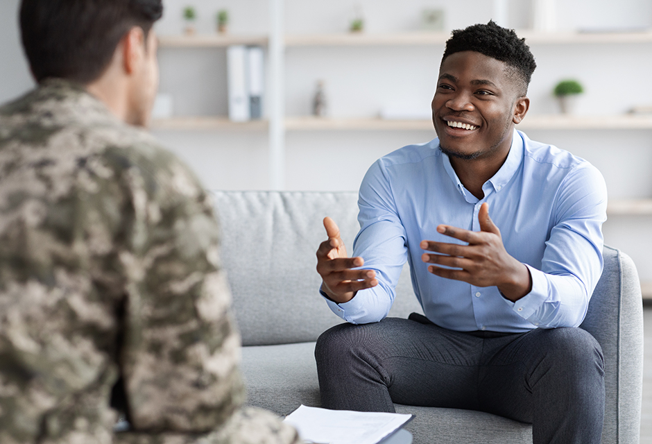 A military service member talks with a tax professional about special tax rules affecting military clients.