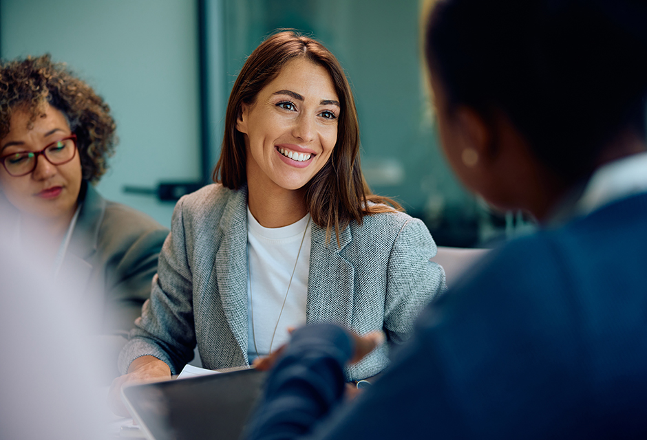 Tax professionals discussing how AI tax research improves client service, efficiency and practitioner judgment