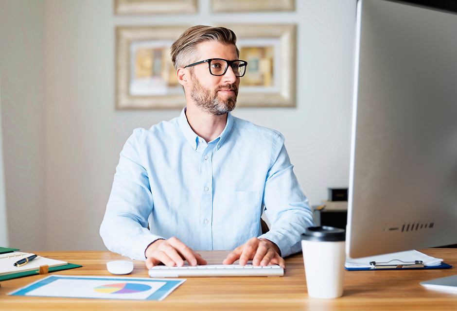 Tax professional reviewing net operating loss carryforward rules and 80% taxable income limitation for 2026 returns