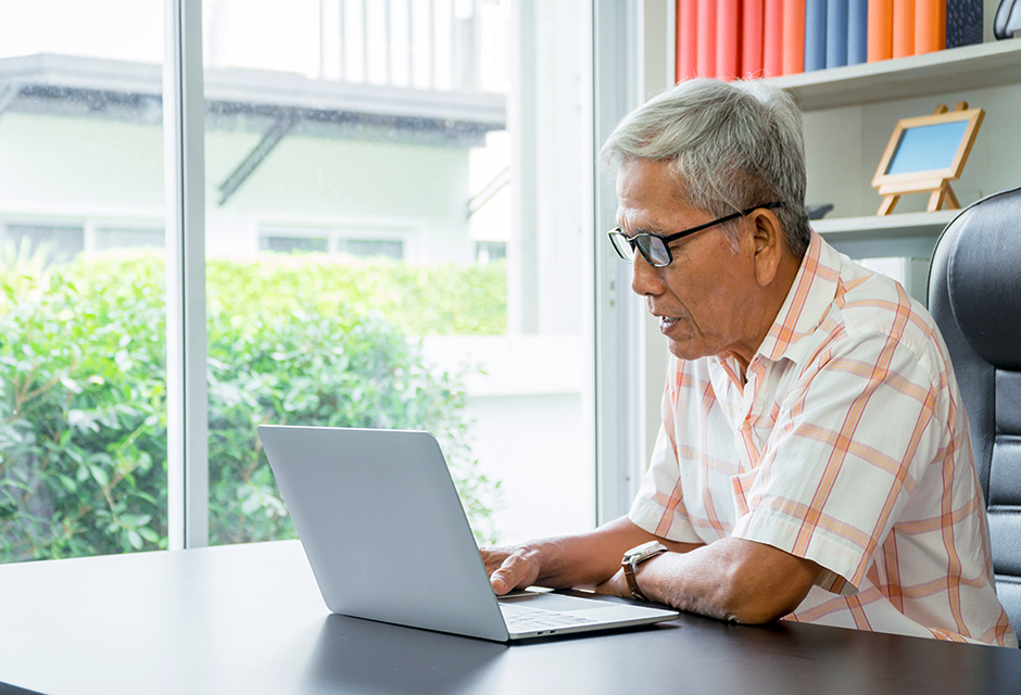 Man reviewing Section 183 hobby loss rules for ranch activity deductions on a laptop