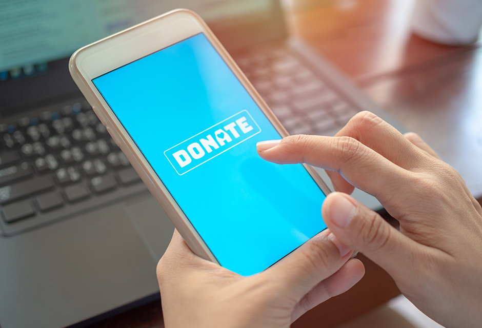 Tax professional reviewing crowdfunding tax rules, Form 1099-K reporting and income exclusions for client campaigns