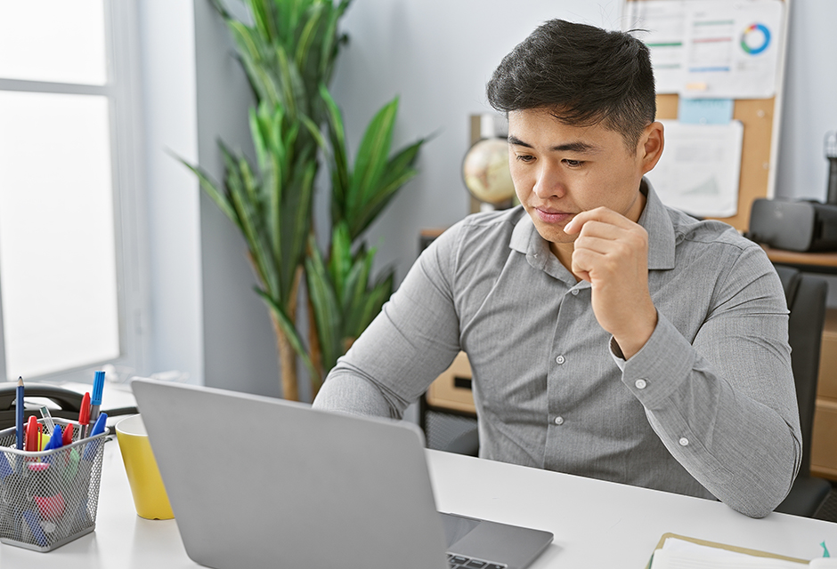 Tax professional reviewing mid-year tax planning strategies to help clients avoid underpayment penalties and year-end tax surprises