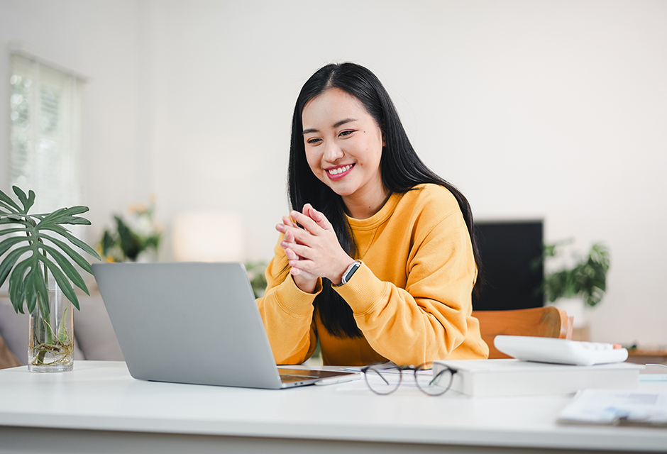 Tax professional reviewing real estate professional passive activity loss rules on a laptop