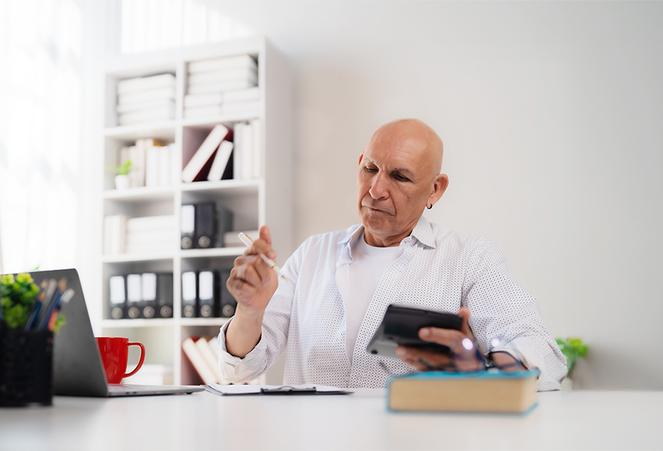 Tax professional reviewing client records for IRS National Standards and tax collection cases