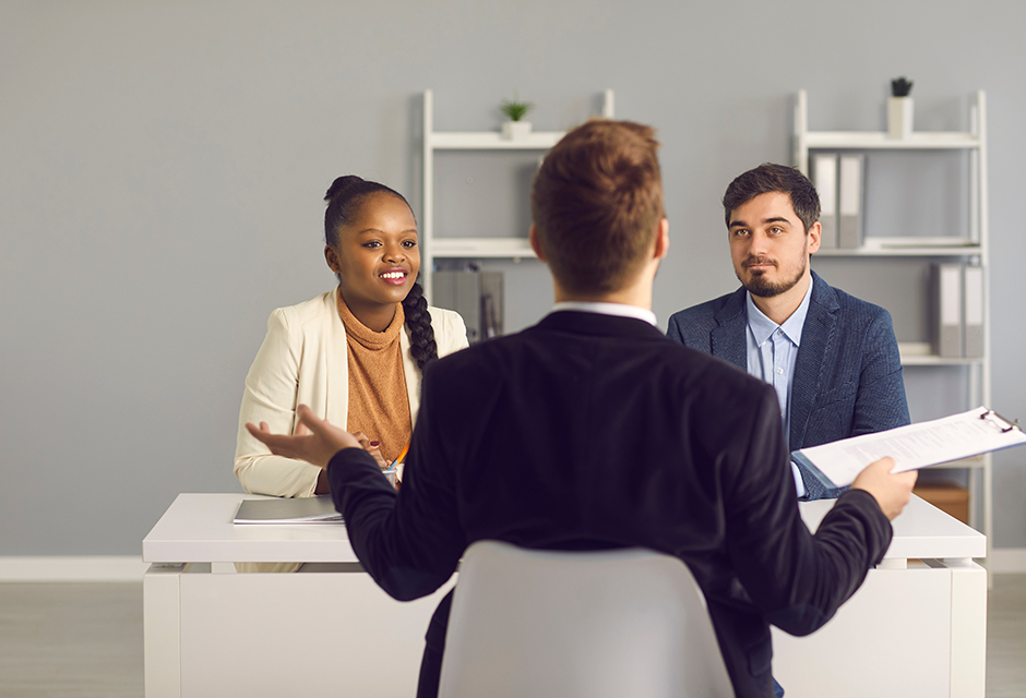 Tax preparer reviewing a client return as mystery shopping reveals filing status, dependency and Schedule C errors by non-credentialed preparers