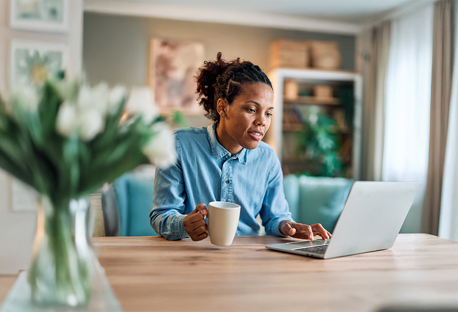Focused tax professional reviewing a client return at a laptop, matching this blog’s guidance on qualified overtime reporting issues that could delay 2027 filings.