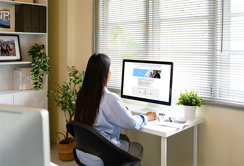 Tax professionals collaborating at a live workshop to master OBBBA tax changes, earn CPE credits and sharpen strategies before busy season