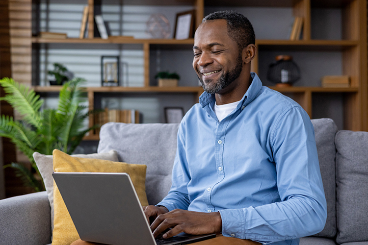 Tax professional reviewing NATP TaxCon agenda to plan CPE sessions on IRS updates and tax law changes