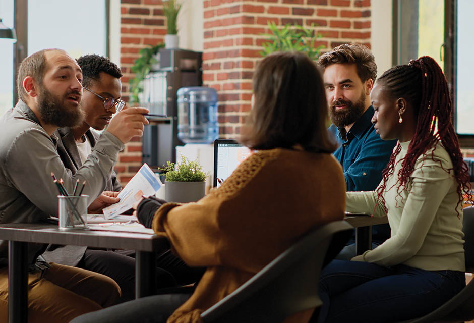 limited partner self-employment tax case discussion among business partners reviewing documents and planning strategy