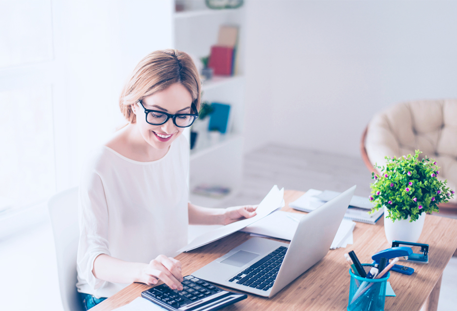 assistant professor teaching graduate tax students in a university classroom, highlighting how a master’s in taxation helps tax professionals advance