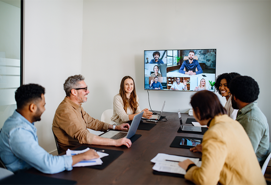 Multi-office tax firm team using secure cloud technology to access and share client files in real time, highlighting efficiency, compliance, and data protection across locations.