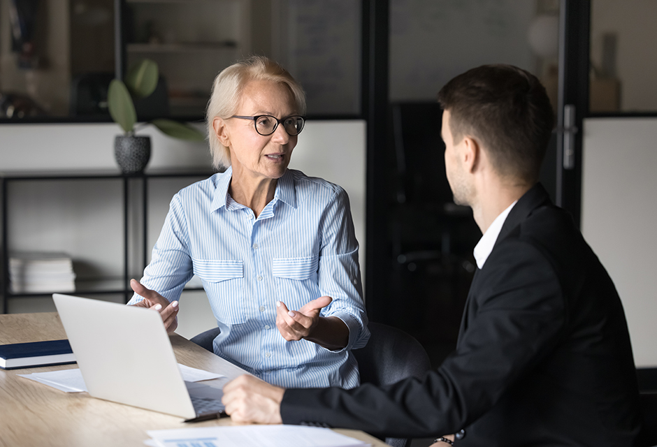Tax professional guides client through IRS field audit process, explaining audit steps, client rights, and possible outcomes to minimize risks.