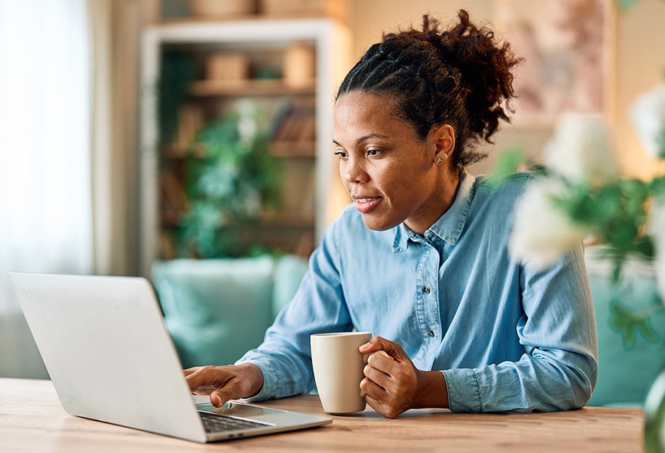 Tax professional reviewing IRS CP590 and CP590A notices on a laptop while preparing due-diligence documentation