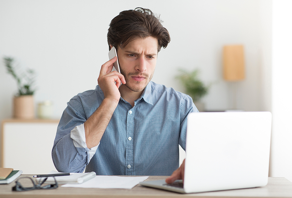 Tax preparer reviewing Form 1040 to avoid common filing mistakes like filing status errors, dependent eligibility issues and incorrect tax credits