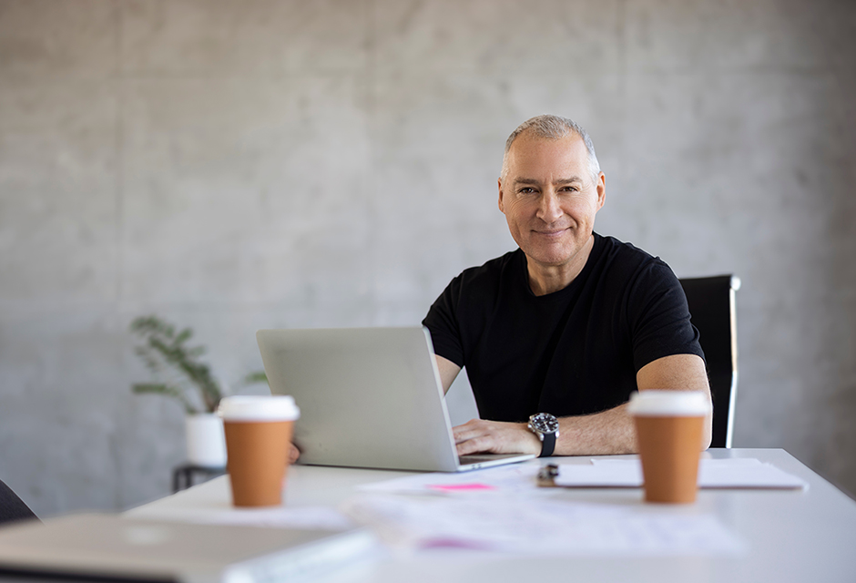 Tax professional reviewing year end depreciation options including §179, bonus depreciation and 2026 planning impacts