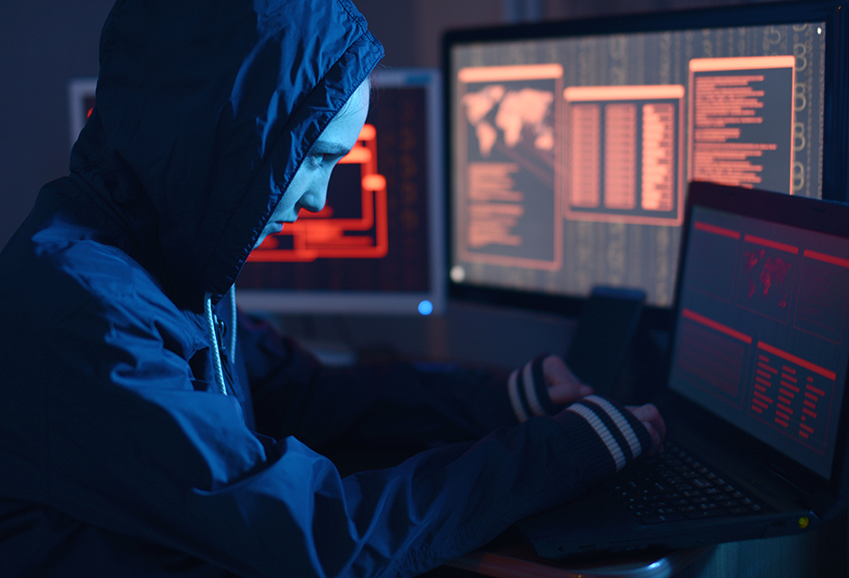 Tax professional reviewing IRS e-Services EFIN activity dashboard, using MFA and security controls to prevent fraudulent e-file submissions.