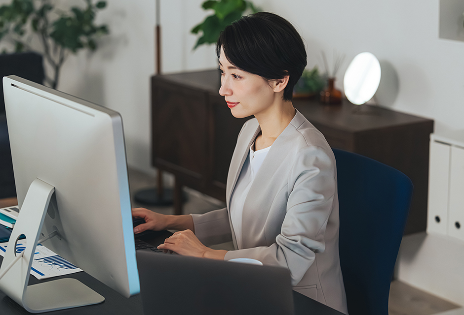 A tax professional reviewing student loan discharge tax impact for clients.