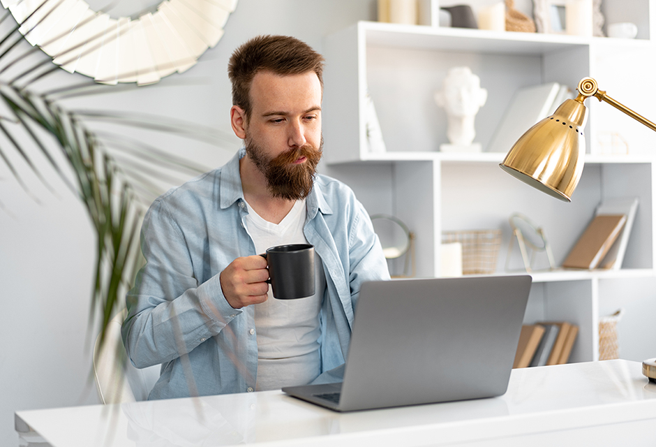 Tax professional reviewing car loan documents and Form 1040 to determine OBBBA qualified passenger vehicle loan interest deduction eligibility